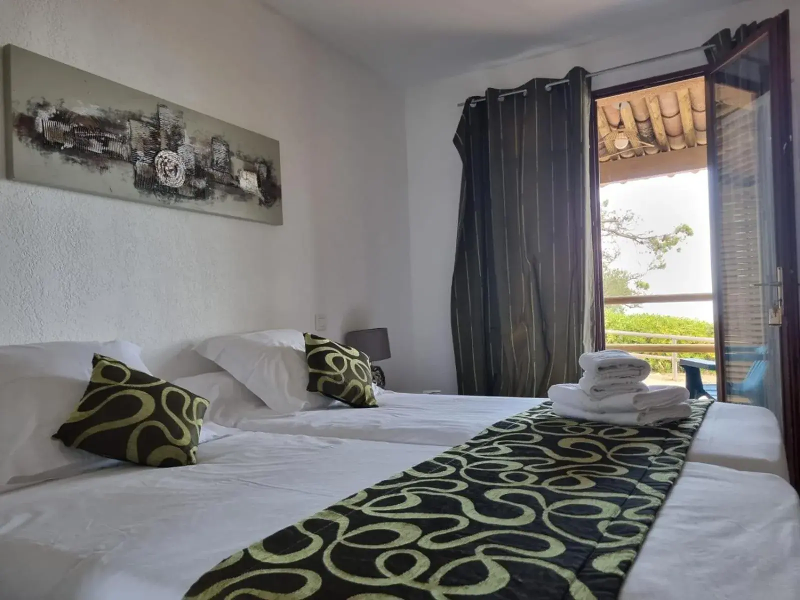 Bed in Bungalows Du Maquis